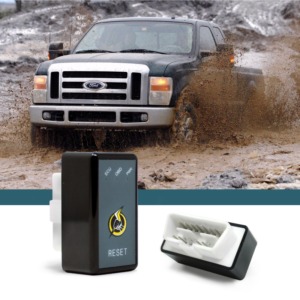 black Ford truck driving through mud and rocks - chip your car performance chips
