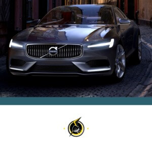 silver Volvo with headlights on - chip your car performance chips