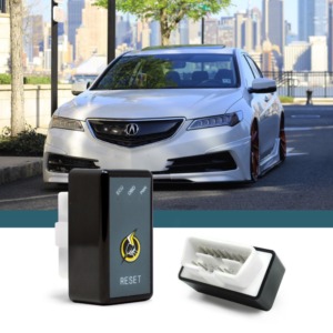 white Acura car driving in the city- chip your car performance chips
