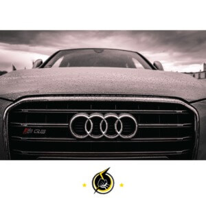 front of a black Audi car - chip your car performance chips