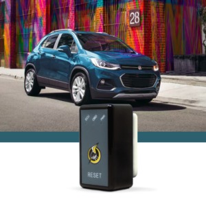 blue car near colorful building - chip your car performance chips