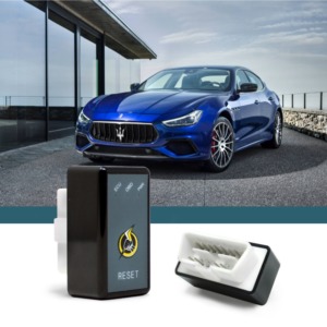 blue Maserati near stone wall - chip your car performance chips