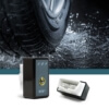 black plug in performance chip near wet tire - chip your car performance chips