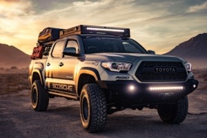 Toyota truck with lights on parked in desert - Chip Your Car Toyota Performance Chips Improve Horsepower