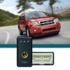 red Ford SUV driving near city - chip your car performance chips