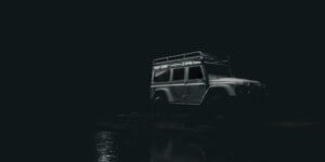 grey Jeep driving at night - chip your car performance chips