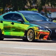 colorful Lexus driving down street - chip your car performance chips