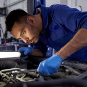 mechanic working on a car engine - chip your car car tuner